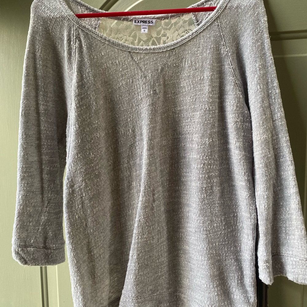 Adorable sweater by Express. Back is extra cute with an all lace material.